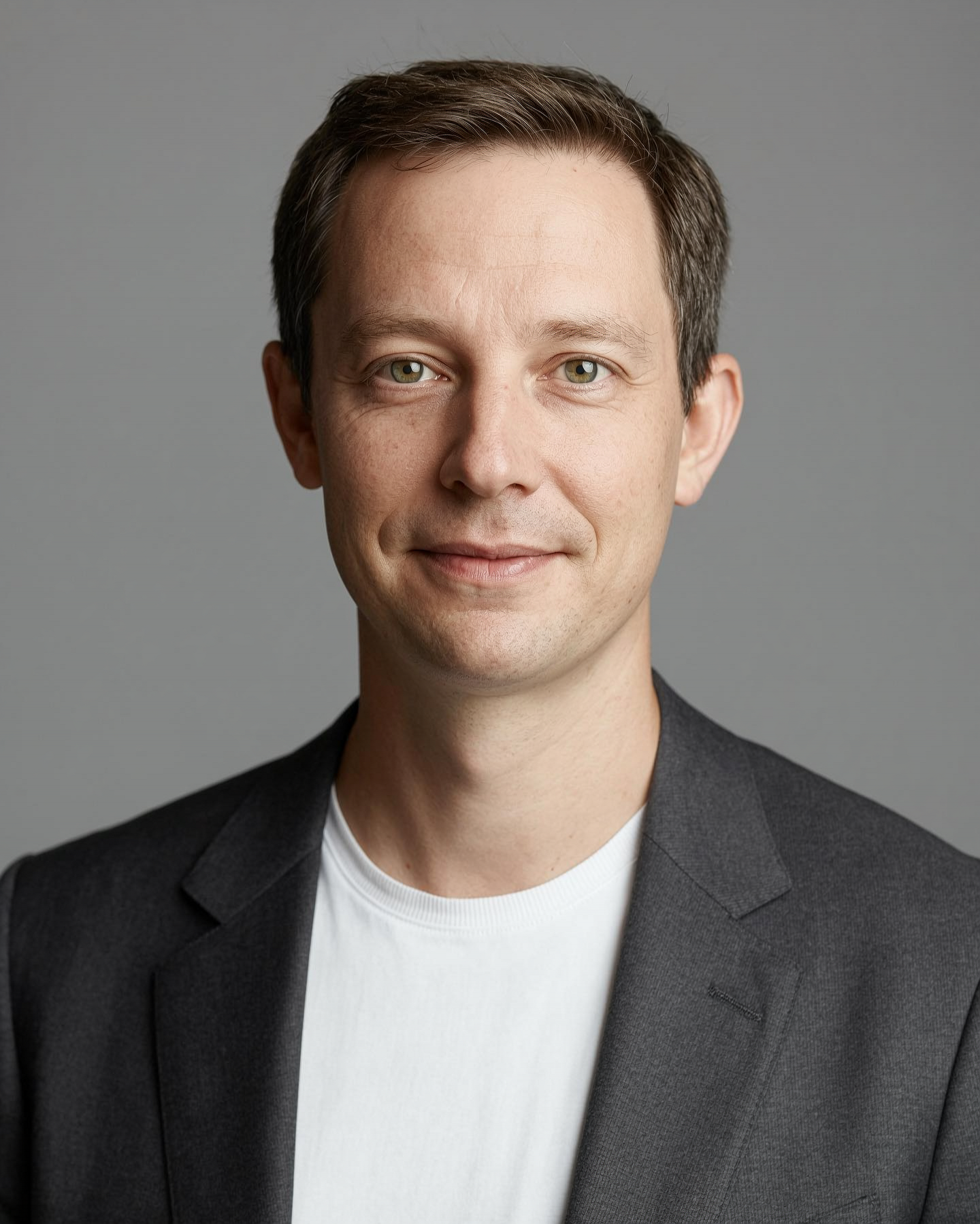 An AI headshot that survives LinkedIn: same face, real skin, no plastic sheen